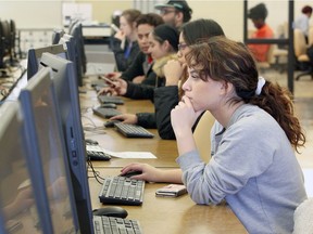 St. Clair College Music Theatre student Mercedes Ranjit studies in the computer room at the main campus Wednesday Dec. 6, 2017.