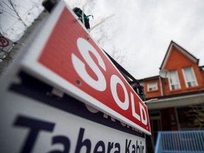 A House for Sale / Sold in Toronto, Ontario, Monday March 7, 2016. As of Jan. 1, shopping for a mortgage will become more difficult thanks to new rules from Canada’s federal financial regulator.