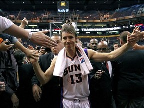 FILE - This April 25, 2012, file photo, shows Phoenix Suns' Steve Nash leaving the court after an NBA basketball game against the San Antonio Spurs in Phoenix. The Phoenix Suns will induct Steve Nash into the franchise's Ring of Honor at halftime of their game against Portland on Oct. 30.
