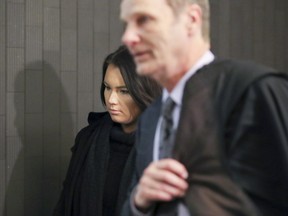 Andrew Barbacki with his client Alison de Courcy-Ireland at the Palais de Justice on Dec. 5.