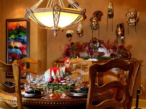-dramatic place settings and circus-themed Xmas decor dress up the formal dining room.Julie Oliver/Postmedia