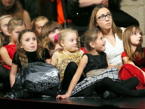 Members of Music Moves Kids react to Dr. Bruce Kotowich's narration of How the Grinch Stole Christmas, part of  Windsor Symphony Orchestra's Toldo Holiday Pops concert at Capitol Theatre Sunday December 17, 2017.