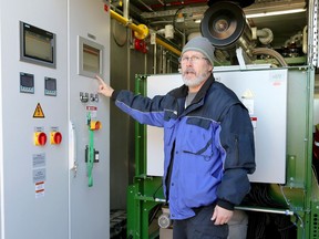 Mike Porter of 2G Energy Inc. completes a test run of newly installed co-generation unit at Huron Lodge on Nov. 29, 2017. The unit combines electric power generation and heating capabilities saving $200,000 a year at the long-care facility.