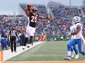Giovani Bernard #25 of the Cincinnati Bengals jumps into the endzone for a touchdown against the Detroit Lions during the second half at Paul Brown Stadium on Dec. 24, 2017, in Cincinnati, Ohio.