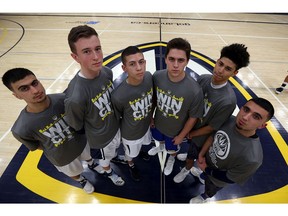 Thomas Kennedy, second from left, photographed with his tier one basketball all star teammates: Ahmed Abou El Hassan, Isiah Byrd, Blake Ondricko, Marquise Laracaston and Ali Mansour (left to right) are photographed at the St. Denis Centre in Windsor on Wednesday, March 22, 2017.