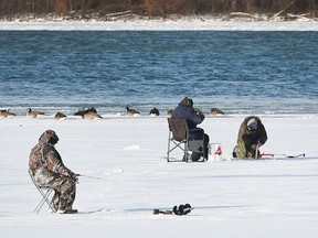Ice fishing enthusiasts take advantage of the freezing cold on the Little River on Dec. 27, 2017.