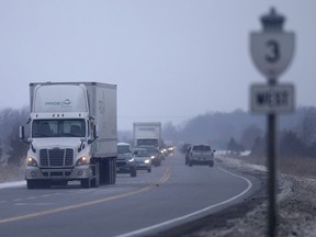 Trucks and cars travel along the two-lane stretch of Highway 3, east of Essex, Dec. 15, 2017.