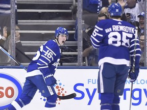 Toronto Maple Leafs centre Mitchell Marner (left) celebrates his first period goal with teammate James van Riemsdyk (25)during first period NHL action in Toronto, Tuesday, December 19, 2017.
