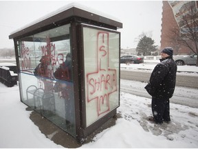 Graffiti is shown painted onto a bus stop on Giles Blvd. East at Ouellette Avenue on Dec. 13, 2017.