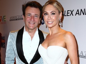 Businessman Robert Herjavec (L) and Kym Herjavec attends the 24th Annual Race To Erase MS Gala at The Beverly Hilton Hotel on May 5, 2017 in Beverly Hills, California. (Photo by Rich Fury/Getty Images)