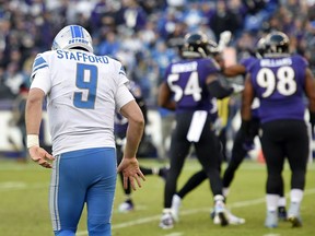 Detroit Lions quarterback Matthew Stafford (9) walks off the field after injuring his hand in the second half of an NFL football game against the Baltimore Ravens, Sunday, Dec. 3, 2017, in Baltimore.