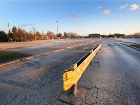 A large parking lot behind the Howard Avenue medical building at Tecumseh Road is shown on Wednesday, Dec. 6, 2017.