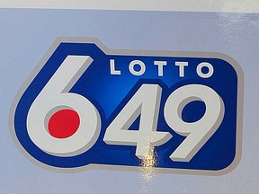 A Lotto 6/49 logo on a prize cheque.