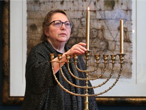 Vesna Rip, a staff member at the Windsor Jewish Community Centre, is shown with a traditional menorah on Tuesday, December 12, 2017. It is the start of Hanukkah and Jewish families lit the first candle Tuesday at sundown.