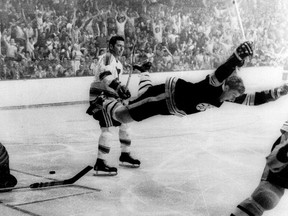 In this May 10, 1970, file photo, Boston Bruins' Bobby Orr goes into the air after scoring a goal against the St. Louis Blues that won the Stanley Cup for the Bruins in Boston. As the NHL celebrates its 100th anniversary, Orr’s goal is so important that, 47 years later, it reached the finals of the NHL's “Greatest Moments."