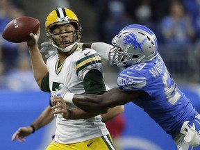 Detroit Lions outside linebacker Tahir Whitehead (59) pressures Green Bay Packers quarterback Brett Hundley (7) during the first half of an NFL football game, Sunday, Dec. 31, 2017, in Detroit.
