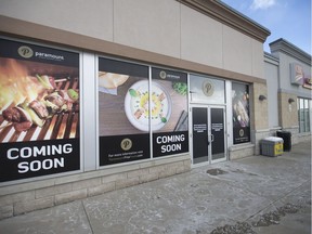 Signs for Paramount Middle Eastern Cuisine are shown at Windsor's Gateway Plaza, Dec. 12, 2017. The fast-growing Middle Eastern cuisine chain is moving into the space.