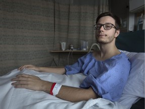 Shawn Florence, shown in his hospital bed in Windsor on Dec. 7, 2017, is facing huge medical expenses after being paralyzed in a skiing accident in Michigan.