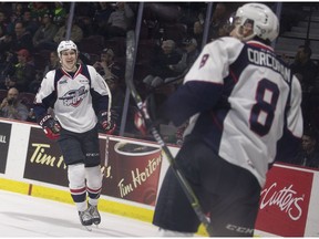 Windsor Spitfires Curtis Douglas, left, and Connor Corcoran are two of the team's four players headed out to NHL rookie camps on Wednesday.