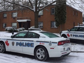 Police officers attend the scene of a stabbing that occurred around 9:50 a.m. Saturday, Dec. 9, 2017, in the 1000 block of Brock Street. A man was taken to hospital with non-life threatening injuries. A man and a woman face possible charges.