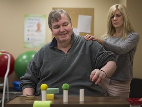 John Humphrey receives physiotherapy from Ann Marie Keough, a neuro physiotherapist with Enable Neurological Rehabilitation on Dec. 18, 2017.