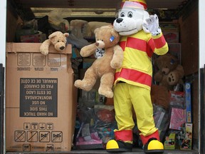 Sparky stands in a moving van filled with donated toys from employees of  Chrysler Canada's Windsor Assembly Plant in this 2013 photo.