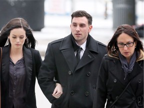 Brandin Crosier, centre, arrives at Ontario court in Windsor on Jan. 12, 2018. Crosier is on trial, charged with criminal negligence causing death in the 2016 crash that claimed the life of Adam Pouget.
