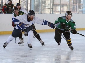 Players participate in the first Annual Windsor Military Hockey Day in Canada at Windsor Lions Outdoor Rink at Lanspeary Park, Jan. 20, 2018.