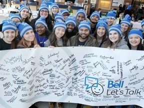 University of Windsor students and staff get behind their pledges to keep the conversation on mental health going during a campus resource fair on Wednesday, which was Bell Let's Talk Day.