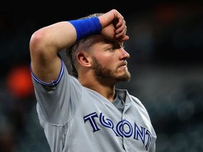 Josh Donaldson #20 of the Toronto Blue Jays looks on after being forced out in the first inning against the Baltimore Orioles at Oriole Park at Camden Yards on August 31, 2017 in Baltimore, Maryland.