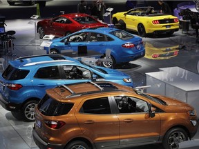 Vehicles staged at The Ford Motor Co. display at the North American International Auto Show on Jan. 16, 2018, in Detroit.