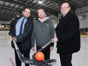 William Quesnel, centre, director of the newly formed Windsor Essex Ball Hockey League and coordinators Kyle Walton, left, and Trevor Lebert are shown on Wednesday, January 3, 2018 at the WFCU Centre. The local league will be part of the Ontario Ball Hockey Association.