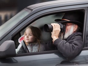 Eagle-eyed Dean Boufford and his granddaughter Nova Brown, 8, scan for bald eagles at Lakeview Park Marina, Jan. 23, 2018, after hearing reports that Windsor's eagle population has recently increased. Centred around Peche Island, up to 40 individual eagles have been spotted by avid bird watchers.