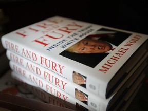 In this Jan. 5, 2018 file photo, copies of the book "Fire and Fury: Inside the Trump White House" by Michael Wolff are displayed at Barbara's Books Store in Chicago.