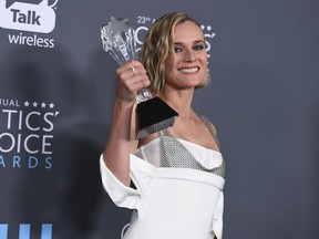 Diane Kruger, winner of the award for best foreign language film for "In The Fade", poses in the press room at the 23rd annual Critics' Choice Awards at the Barker Hangar on Thursday, Jan. 11, 2018, in Santa Monica, Calif.