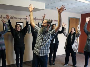 Windsor "laughter yoga" instructor Christopher Lyons leads a session in this 2016 file photo.