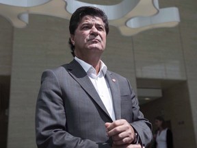 Unifor President Jerry Dias makes his way to speak to the press in Toronto on Aug. 25, 2017. The largest private sector union in Canada says it is splitting with the Canadian Labour Congress over disagreements about the rights of workers to choose what union should represent them.