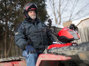 Shawn Ellenberger, vice-president of the Essex County ATV Club, on his personal all-terrain vehicle in Windsor on Jan. 2, 2018.