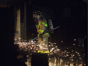 Windsor firefighters battle a detached garage fire on the 1600 block of Benjamin Avenue on Wednesday.