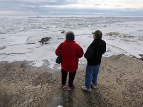Colchester Beach had an arctic look to it on Jan. 24, 2018, as ice piled up close to the shoreline. Peter Knapp and Mona McKie of Windsor check out the scene from the harbour dock.