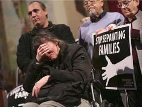 Flora Rranxburgaj breaks down as she talks about how she needs the help of her husband, standing left, and cannot do without him if he gets deported, during a press conference after he took sanctuary at Central United Methodist Church while facing deportation in Detroit. Ded Rranxburgaj and his wife Flora Rranxburgaj, both from Albania, immigrated to the U.S. 17 years ago and applied for refugee status within 5 months of their arrival. Eleven years ago Flora fell ill with Multiple Sclerosis and her husband Ded has had to take care of her since. Central United Methodist Church is offering sanctuary to Rranxburgaj of Southgate, who is scheduled to be deported Jan. 25.