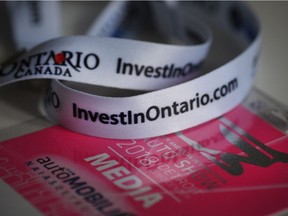 "InvestInOntario.com" is shown on a North American International Auto Show lanyard, Friday, Jan. 12, 2018.