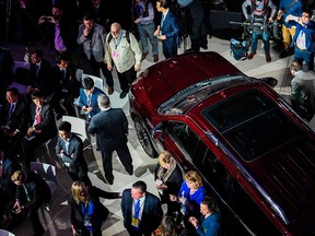 Attendees of the press preview of the North American International Auto Show gather around a Lincoln Navigator on Jan. 15, 2018. The Navigator was recognized as North American Truck of the Year.