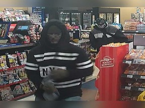 A security camera image of two people who robbed a Mac's convenience store on Mill Street in Windsor's west end on Jan. 21, 2018.