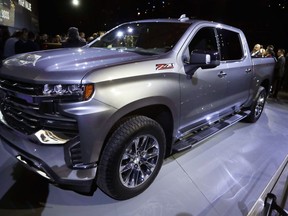 The 2019 Chevrolet Silverado High Country pickup is unveiled, Saturday, Jan. 13, 2018, in Detroit. The Silverado is the second-best selling vehicle in the U.S. and is outsold only by Ford's F-Series pickups. Big pickup truck sales rose nearly 6 percent last year to almost 2.4 million, even though total U.S. auto sales dropped 2 percent. One in every seven vehicles sold last year was a full-size pickup.