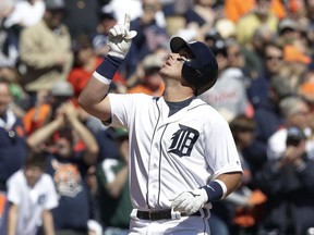 Detroit Tigers' James McCann looks skyward after scoring on his solo home run during the fifth inning of a baseball game against the Boston Red Sox on April 8, 2017, in Detroit.