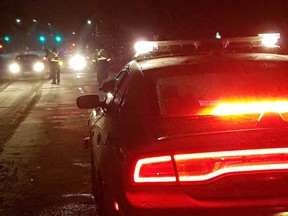 Essex County OPP and Windsor police vehicles at a RIDE stop on Dec. 28, 2017.