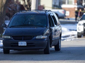The minivan that was involved in a collision with a pedestrian and another vehicle on St. Luke Road in Windsor's Ford City on Dec. 23, 2017. The minivan driver has since been charged with careless driving.