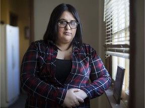 Rachel St. Denis, who is going public with her attempted suicide eight years ago to raise awareness, is pictured in her home, Thursday, Jan. 4, 2018.