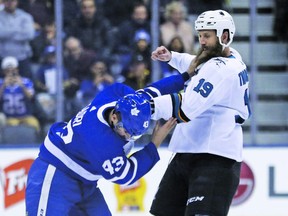 Toronto Maple Leafs Nazem Kadri C (43) and San Jose Sharks Joe Thornton C (19) drop the gloves right of the fac-off during the first period in Toronto on Friday January 5, 2018. Jack Boland/Toronto Sun/Postmedia Network